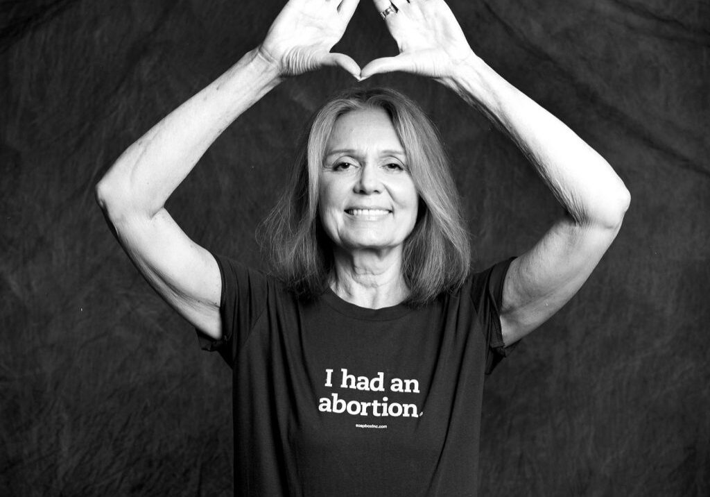 Gloria Steinem, 71 (at the time the photo was taken), entered the feminist movement the day she covered Red Stockings abortion speak-out for New York magazine, and finally owned the abortion she had had several years earlier. She describes her abortion as the first time she acted in her own life, rather than let things happen to her. She had her abortion when she was 22. Gloria went on to found several pro-choice organizations, including Voters for Choice and Ms. Magazine and considers reproductive freedom to be the most significant contribution of the 2nd wave feminism.