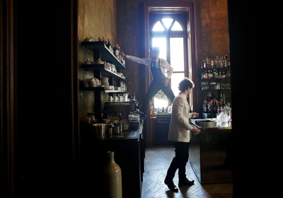 Waiters work in the kitchen of Soho House, Istanbul.